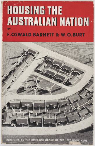 Aerial view of suburban houses. Title text printed in white and black on red banner.