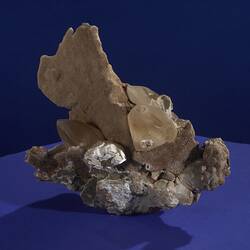 Cream and brown crystal specimen.