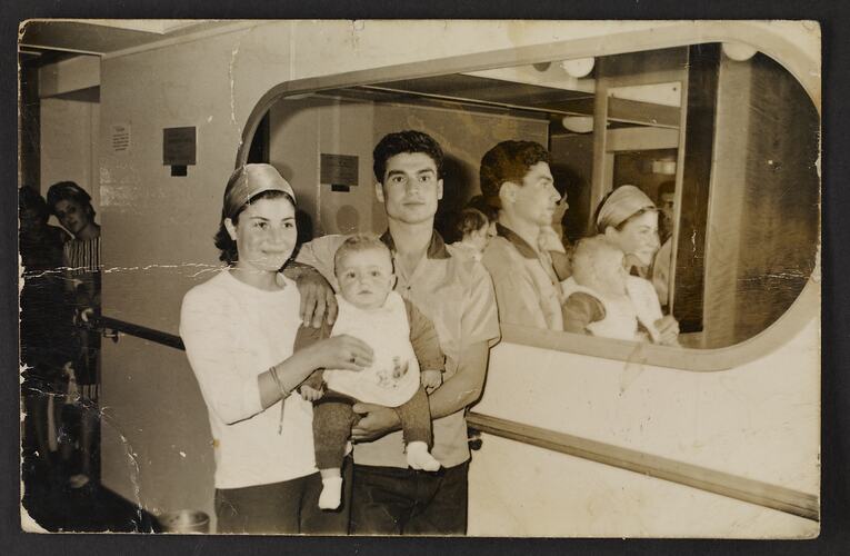 Portrait of a migrant family aboard the ship Patris