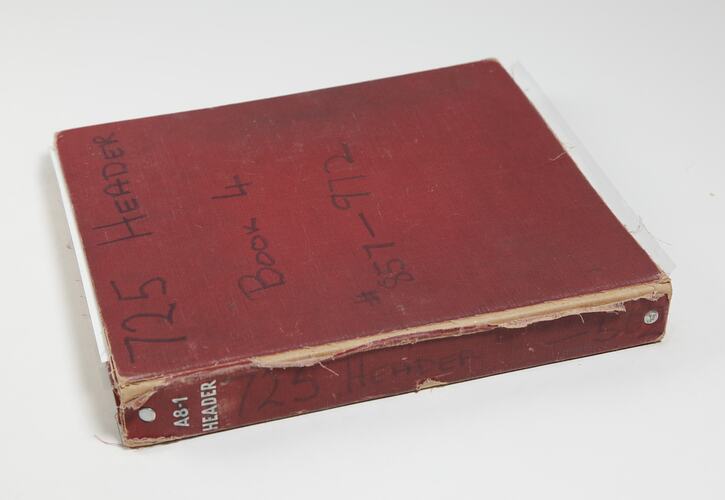 Photograph Album of harvesting equipment.