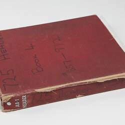 Photograph Album of harvesting equipment.