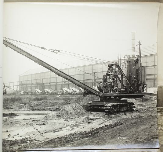 Monochrome photograph of a dragline excavator.