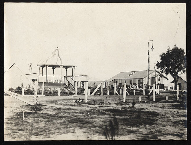 Monochrome photograph of a military camp.