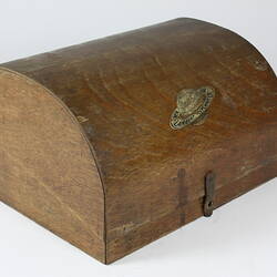 Wooden box with planet label.
