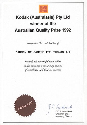 Signed certificate with brown 'Kodak 1992' seal.