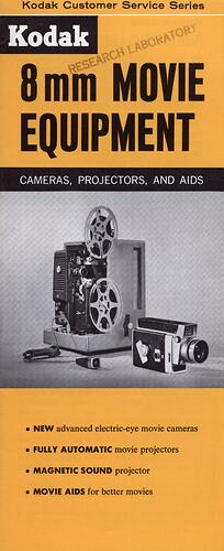 Leaflet cover with text and photograph of projector.