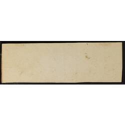 Underside of paper-covered wood microslide.