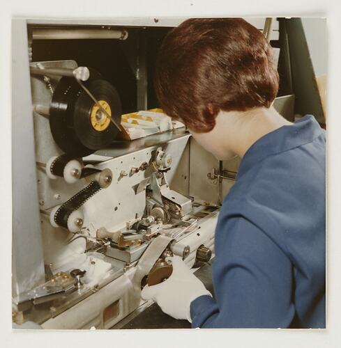 Slide 238, 'Extra Prints of Coburg Lecture', Worker at Rapid Slide Mounting Machine, Building 20, Kodak Factory, Coburg, circa 1960s