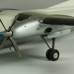 Blue and white model of a two -engined aeroplane.