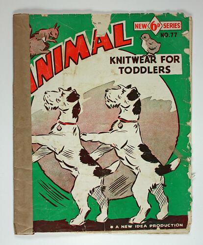 Knitting book cover with drawing of two dogs.