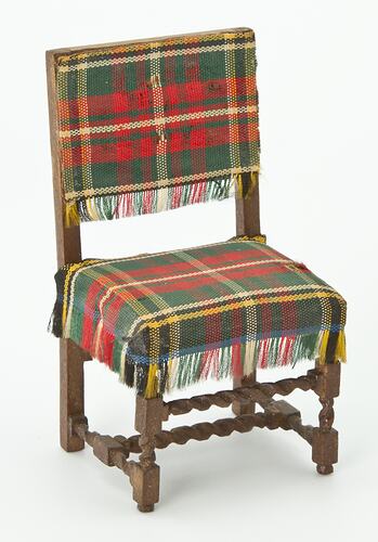Toy wooden dining chair with tartan upholstery. From doll's house.