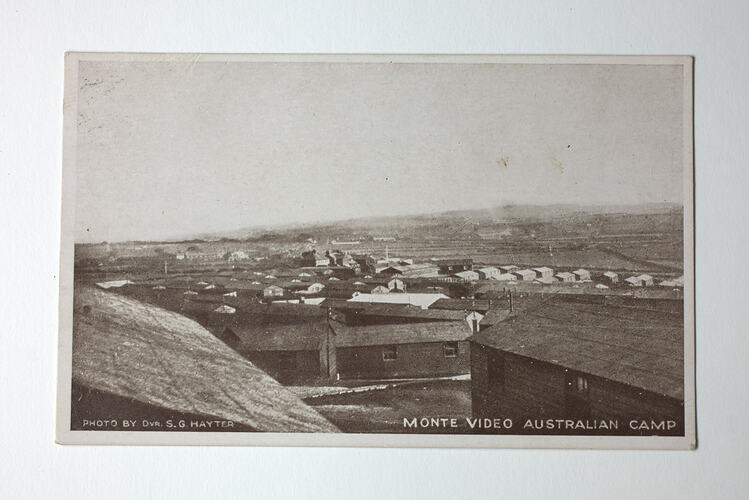 Barracks in undulating landscape.