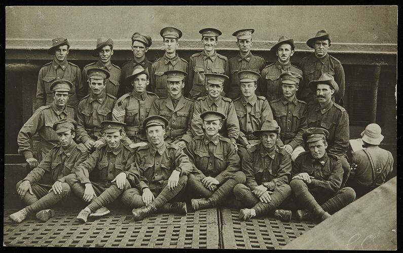 Twenty two uniformed Australian soldiers in three informal rows.