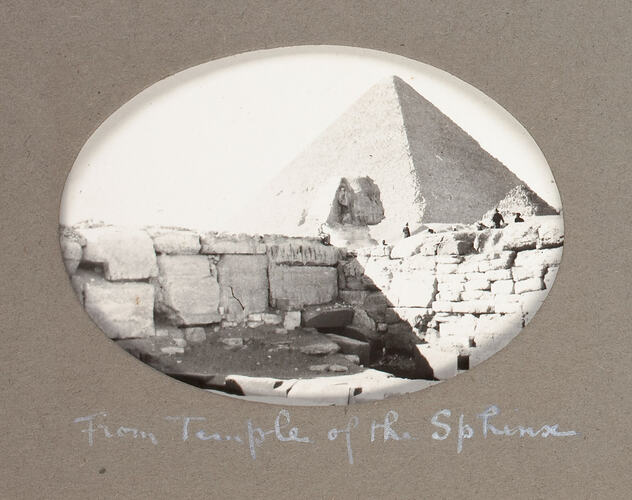 Wall, sphinx and pyramid.