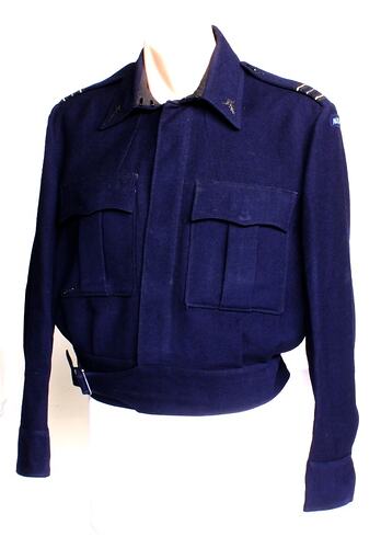 Blue bomber jacket on mannequin.
