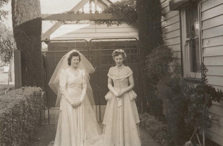 Digital Photograph - Bride & Bridesmaid on Wedding Day, Driveway, Coburg, 1948