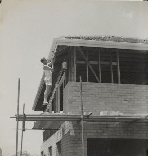 Digital Photograph - Man Painting Roof Guttering, House Building Site, Greensborough, circa 1958