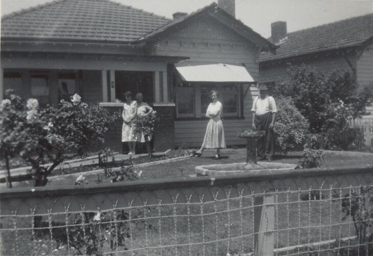 Digital Photograph - Family Standing outside Californian Bungalow, Pascoe Vale, circa 1950