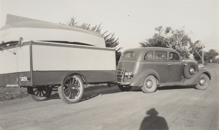 Part of a group of six photographs depicting the Rolfe family of Elsternwick on camping holidays with the pop-up caravan trailer built by motor body builder Charles W. Rolfe.