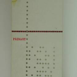 Strip of white paper with punched holes and red printed text.