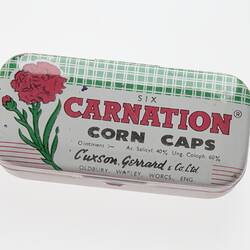 Carnation corn caps metal tin.