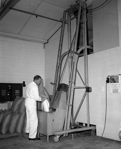 Negative - Coca-Cola, Worker Filling Machinery at Factory, Moorabbin, Victoria, Aug 1954
