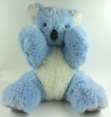 Light blue and white toy koala.