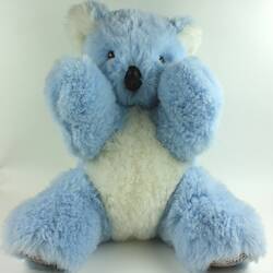 Light blue and white toy koala.