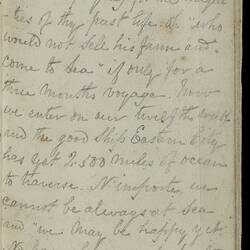 Open diary with handwritten text on discoloured worn page.