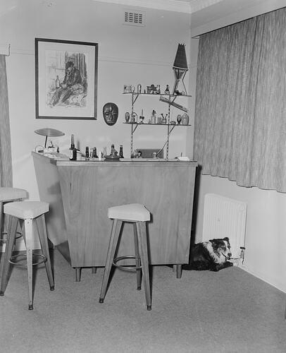 Dog Sitting Next to an Alcoholic Bar, Domestic Interior, Victoria, 20 Aug 1959