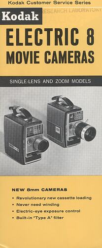 Printed text and photograph of two cameras.