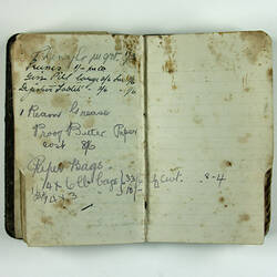 Inside pages, hand-written, of black book.