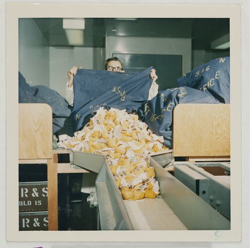 Worker Emptying Mail Bag of Films for Processing, Kodak Factory, Coburg, circa 1960s