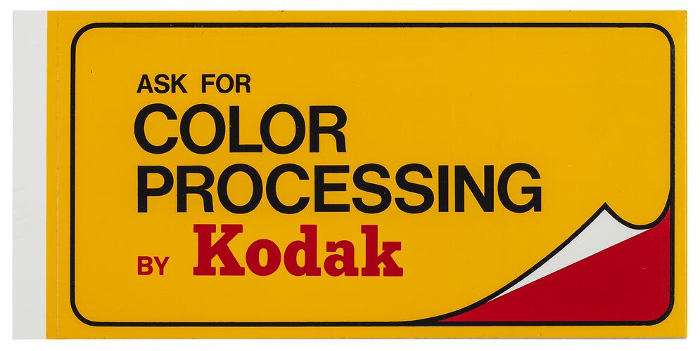 Yellow rectangular Kodak branded sticker.