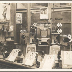 Black and white photograph of a display window.