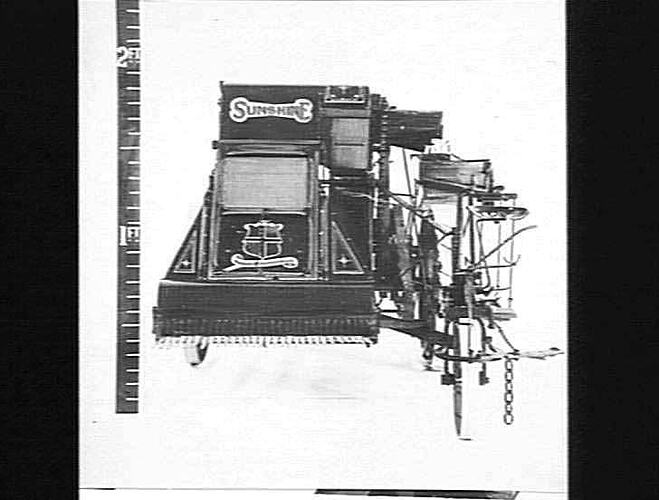 MODEL OF 5 FT SUNSHINE HARVESTER MADE IN 1899. PHOTOGRAPH TAKEN IN MARCH 1930.