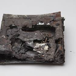 Fire afffected melted computer hard drive.