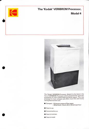 White cover page with black text and a white and black box-like machine with slit opening at top.