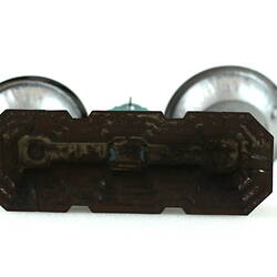 Toy metal scales, underside.