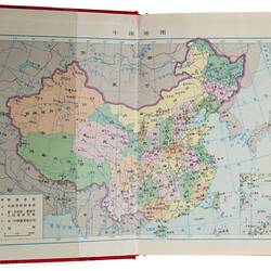 Open book with colour map of People's Republic of China.
