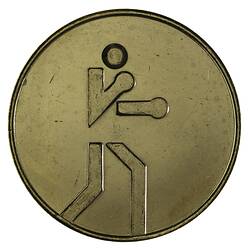 Round gilt medal with boxing logo from Brisbane Commonwealth Games.