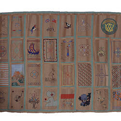 Front of curtains with extensive embroidery.