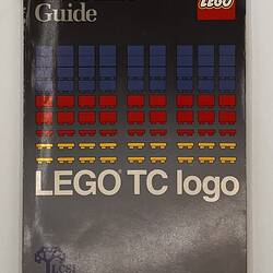 Front cover with rows of separate Lego pieces in blue, red and yellow. Text above and below.