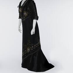 Black, silk satin dress, beading, floral embroidery.