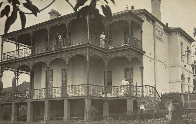 Digital Photograph - Front view of 'Colchester', Two Story House with Elaborate Verandah, Northcote, 1921