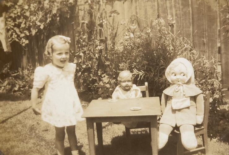 Digital Photograph - Girl with Dolls, Backyard, Brunswick, 1946