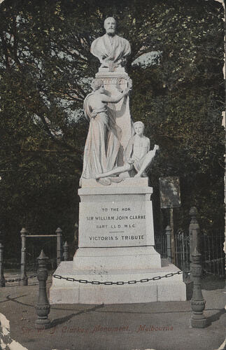 Postcard with a statue on it.