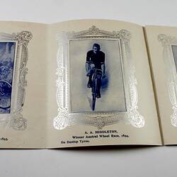 Printed souvenir pamphlet with three photographs of cyclists.