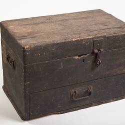 Closed wooden chest.