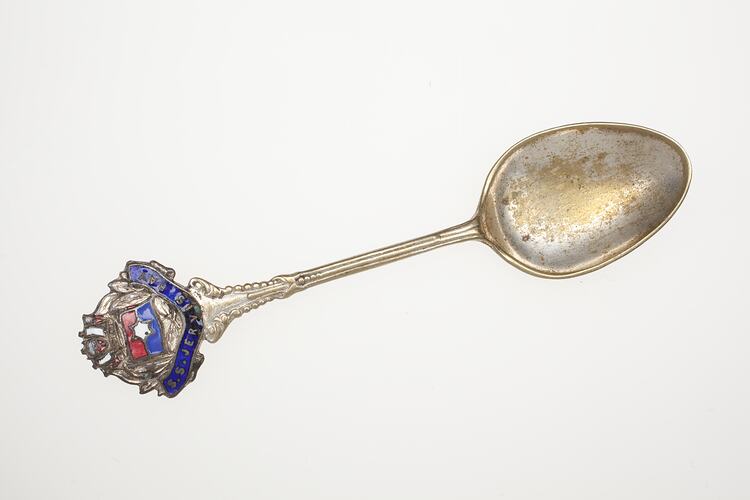 Souvenir silver teaspoon.